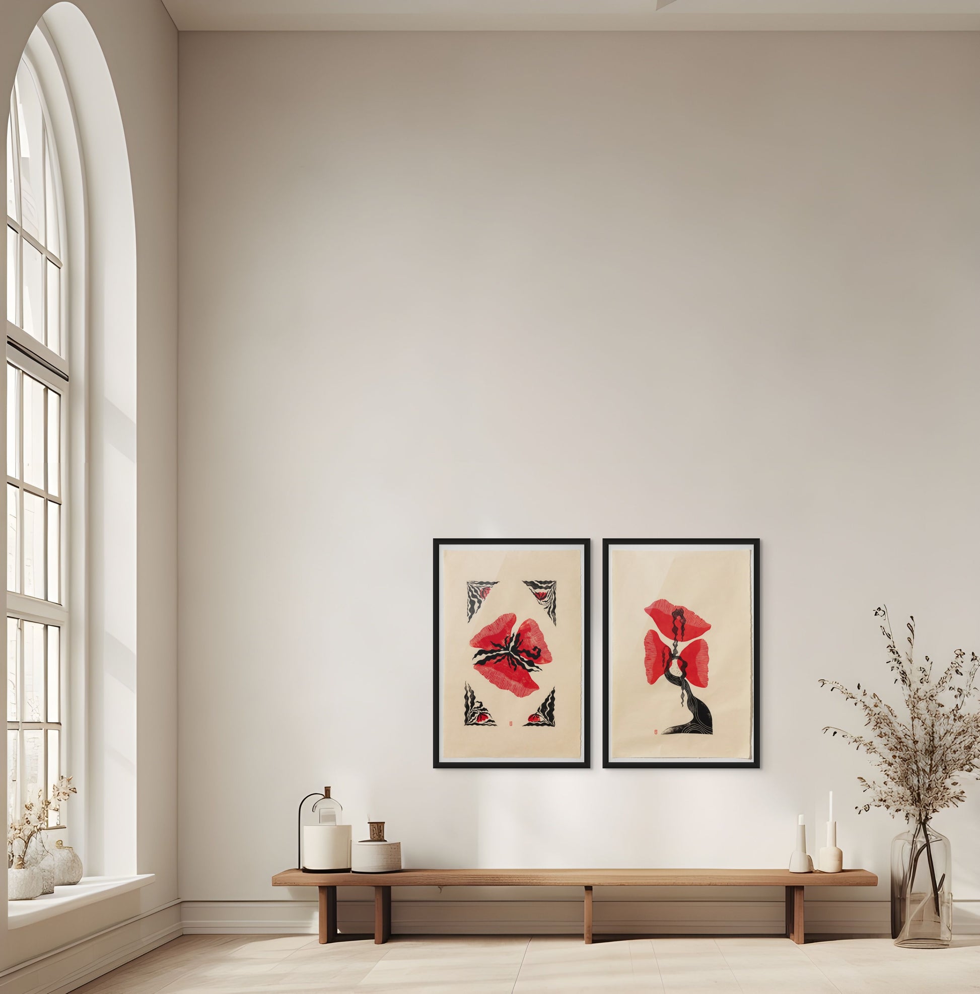 Two framed artworks on a wall with a wooden bench and decorative items below.